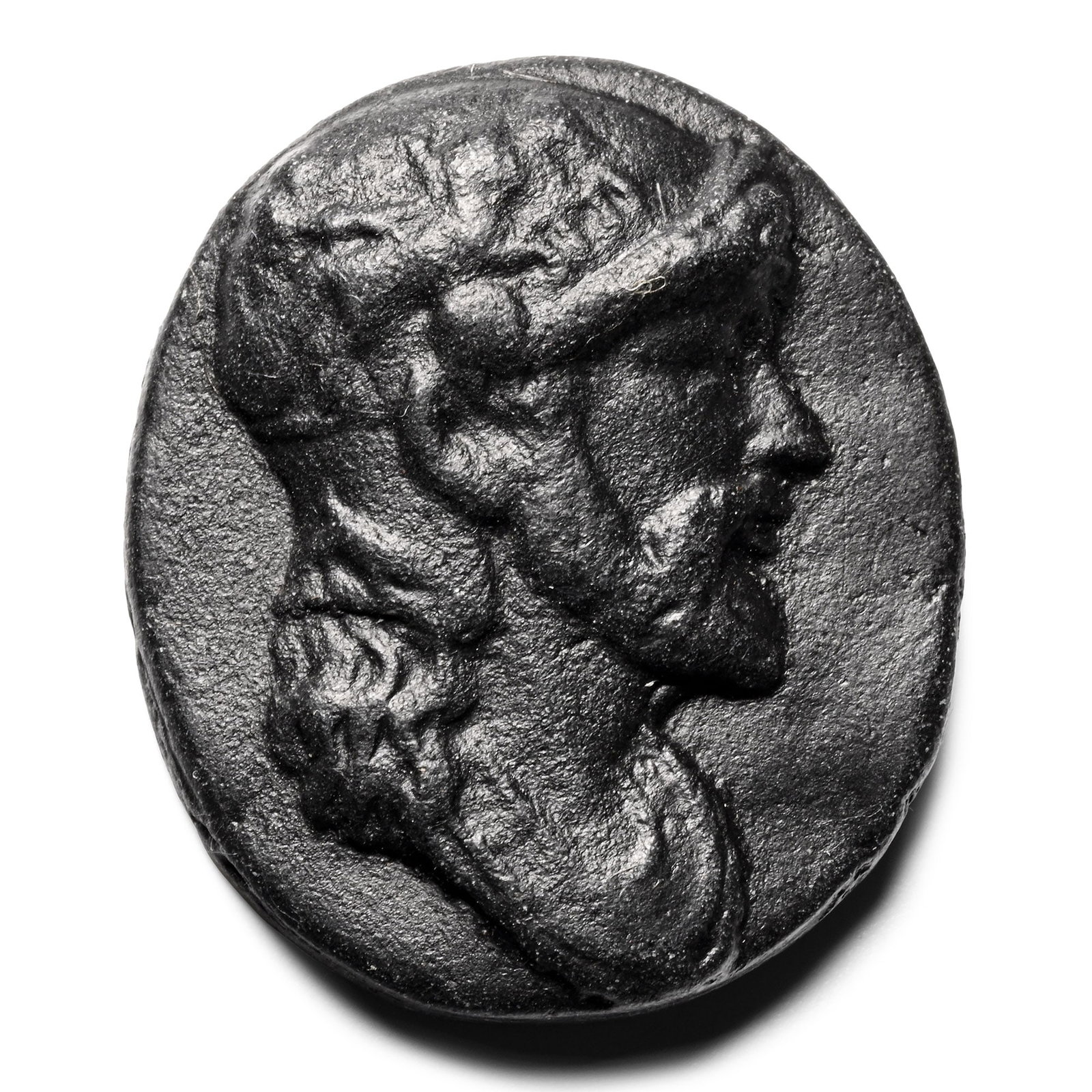 Post Medieval Black Glass Cameo of a Bearded Man: 20th century A.D. Oval cameo with a profile bust of a bearded man wearing a helmet with a leaping lion. 4.15 grams, 29 mm (1 1/8 in.). [No Reserve] Acquired on the European art market. TimeLine Auctio