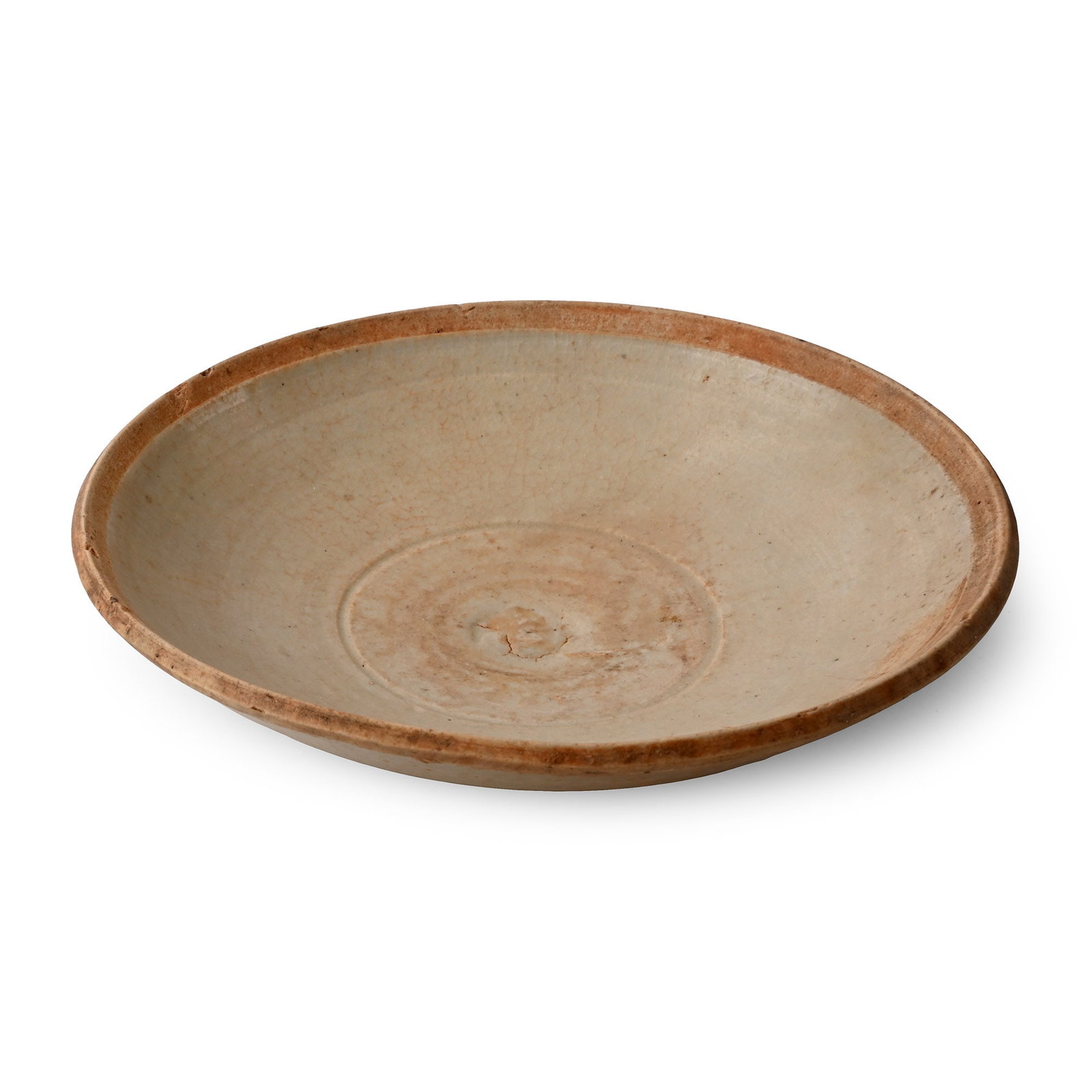 Chinese Tang Cream Ware Bowl: Tang Dynasty, 618-907 A.D. or later. Shallow bowl with a low basal ring. 177 grams, 14.5 cm (5 3/4 in.). [No Reserve] Ex Hong Kong gentleman's collection. TimeLine Auctions follows a rigorous vetting 