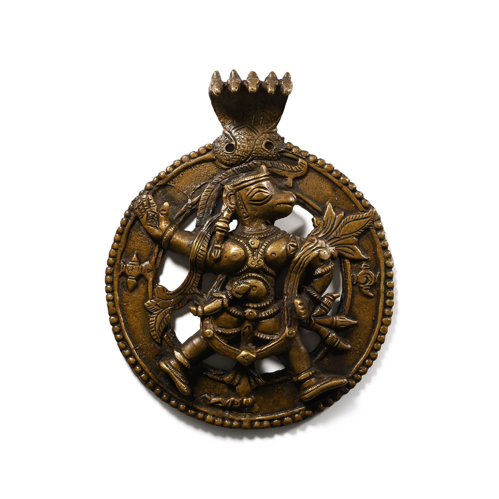 Indian Sacred Copper-alloy Plaque with Hindu God: Late 19th-early 20th century A.D. Figure of Hanuman advancing in a roundel, modelled in the half-round. 372 grams, 15.8 cm (6 in.). From the Jeffrey Romer important collection of Hindu art, 1990s. Ex 