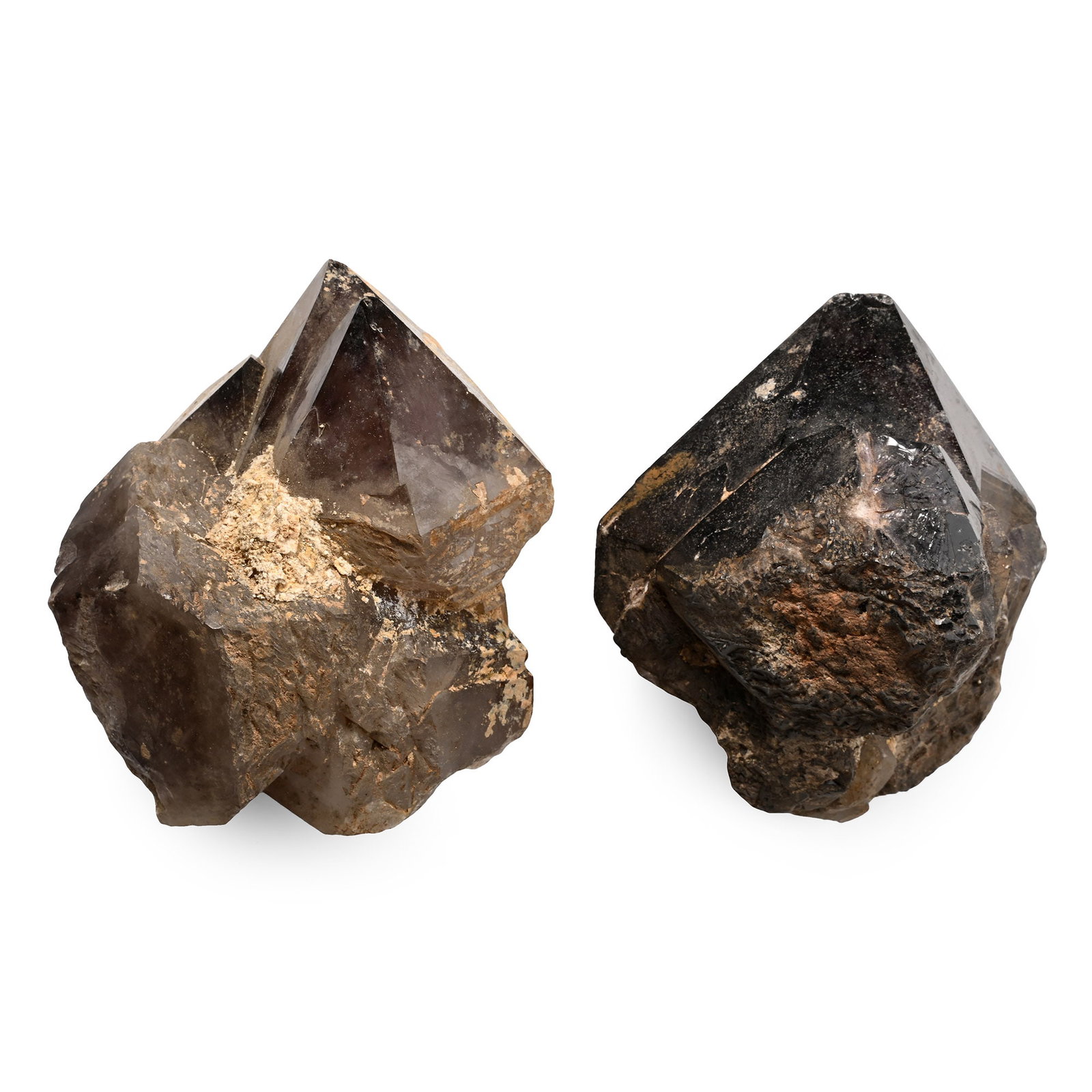 Two Massive Smoky Quartz Crystal Specimens: Comprising two specimens of large intergrown pyramidal smoky quartz crystals. 2.38 kg total, 12.3-12.4 cm (4 7/8 in.). [2, No Reserve] From Brazil. Ex Mineral Imports, London, UK. Gregory, Bottley & L
