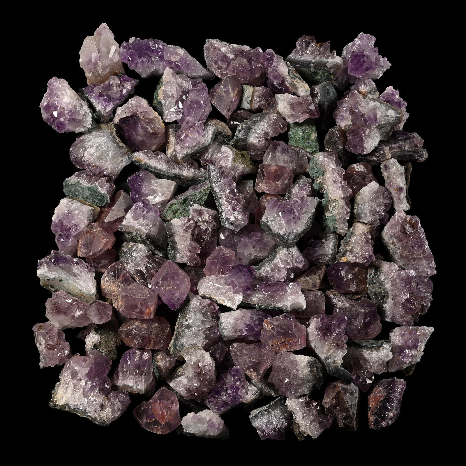 Large Group of One Hundred [100] Amethyst Crystal Sections: Comprising mainly irregular geode sections with prismatic amethyst crystals. 2.19 kg total, 21-66 mm (7/8 - 2 5/8 in.). [100, No Reserve] From Brazil. Ex Mineral Imports, London, UK. Gregory, Bottley 