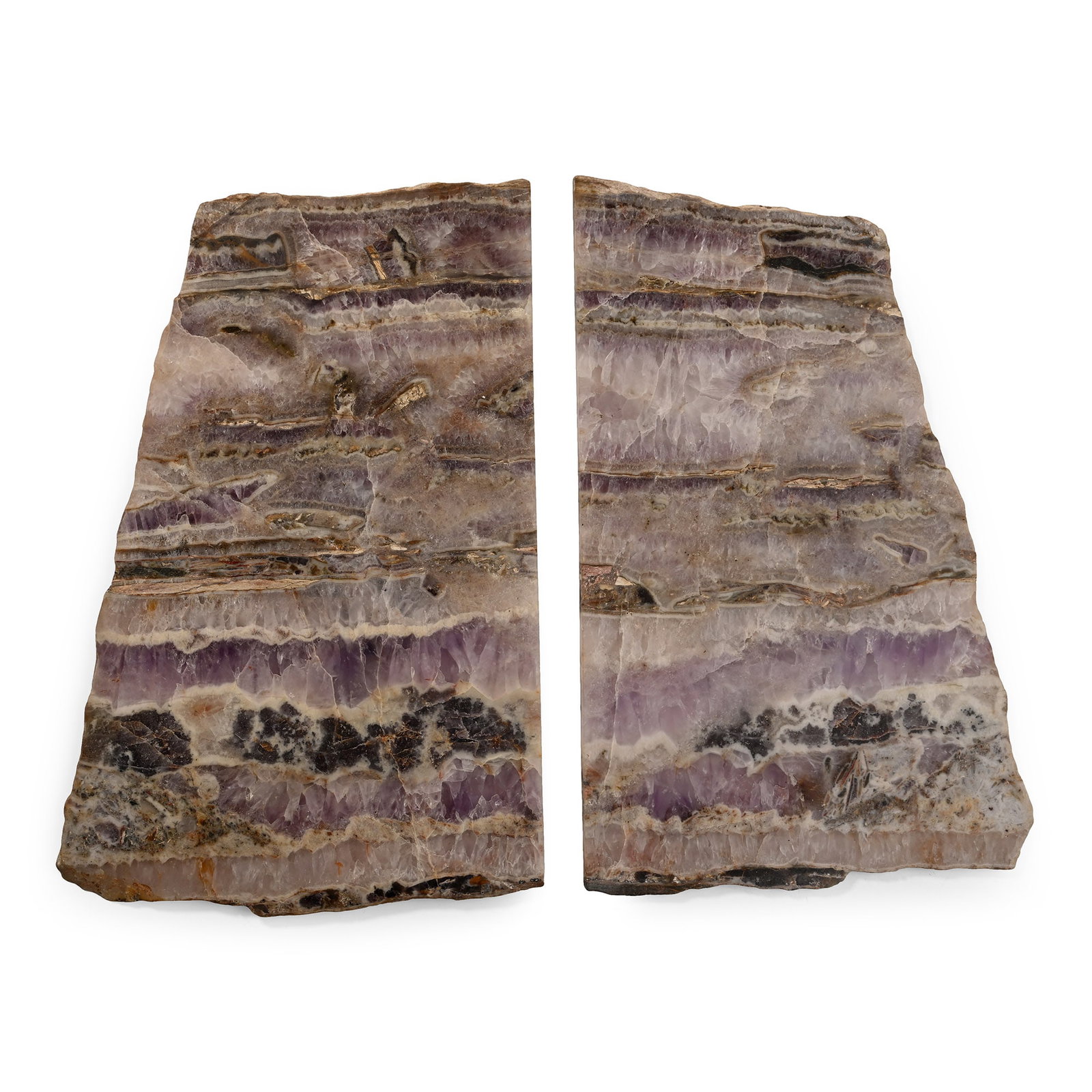 Two Large Cut and Polished Slabs of Rare Vintage Blue John Fluorite: Two irregular slabs showing typical purple, blue and white banding. 935 grams total, 25.1-25.6 cm (9 7/8 - 10 in.). [2, No Reserve] From the UK. Ex Mineral Imports, London, UK. Gregory, Bottley & Lloy