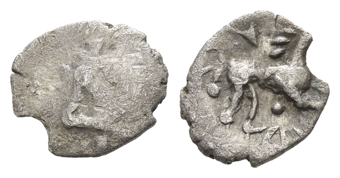 Celtic Britannia. Iceni, Ecen AR Half Unit.: Circa AD 25-38. Mine Ece type. Back-to-back crescents in diamond shape / Horse to right; above, pellet triad each side of V-shape; below, ECE. ABC 1687; Van Arsdell 742; SCBC -. 0.37gr, 11mm, 4h. Near