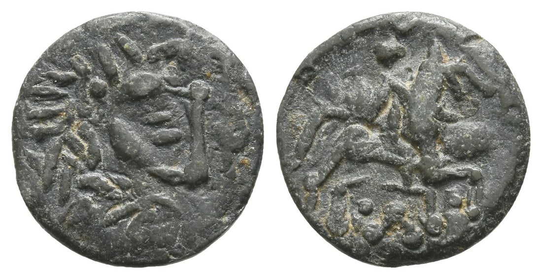 Celts in Eastern Europe AE 'Tetradrachm'.: 3rd-2nd century BC. Imitations of Philip II of Macedon. 'Banat' type (?). Celticized head of laureate Zeus to right / Horseman to right; ?? below. G?bl OTA -; Lanz -; cf. Nomos AG, Obolos 5, 38. 3.30g
