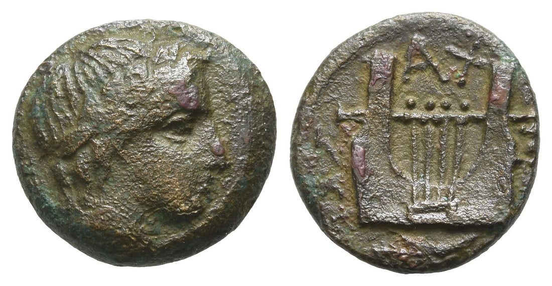Macedon, Olynthos AE 16mm.: Circa 432-348 BC. Laureate head of Apollo to right / XA?KI?E?N (retrograde) around lyre. SNG ANS 552-553. 3.90gr, 16mm, 9h. Very Fine. Acquired on the European coin market. Property of a Kent, UK, gen
