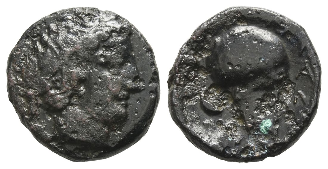 Macedon, Skione AE 19mm.: Circa 400-350 BC. Male head to right, wearing tainia / Corinthian helmet to right. Cf. AMNG III/2, 7; HGC 3, 681. 5.03gr, 19mm, 7h. Near Very Fine. Acquired on the European coin market. Property of a 