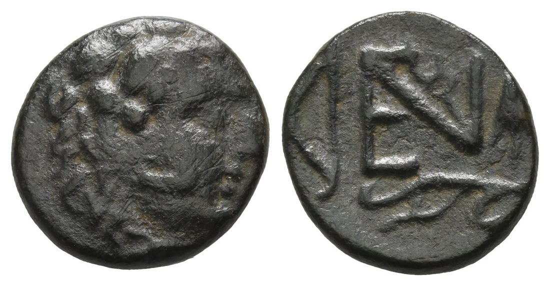 Asia Minor, Uncertain mint (or Paphlagonia, Enetoi) AE 18mm.: Circa 3rd-2nd century BC. Head of Herakles to right, wearing lion-skin headdress / Monogram of EN containing kerykeion; bow to left, arrow head upwards to right, aphlaston below. Imhoof-Blumer, Kleina