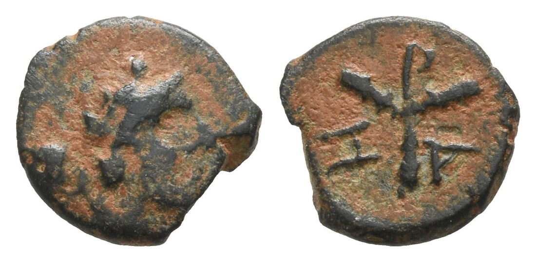 Bithynia, Herakleia Pontica AE 11mm.: 3rd-1st century BC. Wreathed head of Dionysos(?) to right / H-P-A between three clubs. Cf. RG 63-64. 0.96gr, 11mm, 12h. Near Very Fine. Exceedingly rare; no other on the market since the last twenty y
