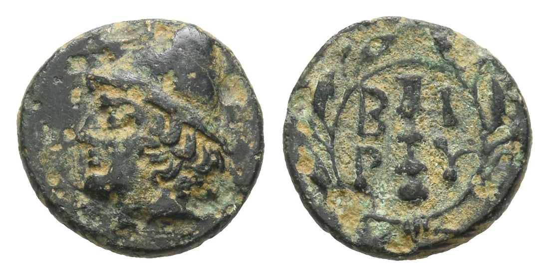 Troas, Birytis AE 11mm.: Circa 350-300 BC. Head of Kabeiros to left, wearing pileus / B-I P-Y, vertical club, all within laurel wreath. SNG Copenhagen 247-49; SNG von Aulock 1502; Klein 302. 1.08gr, 11mm, 12h. Very Fine. Acqu