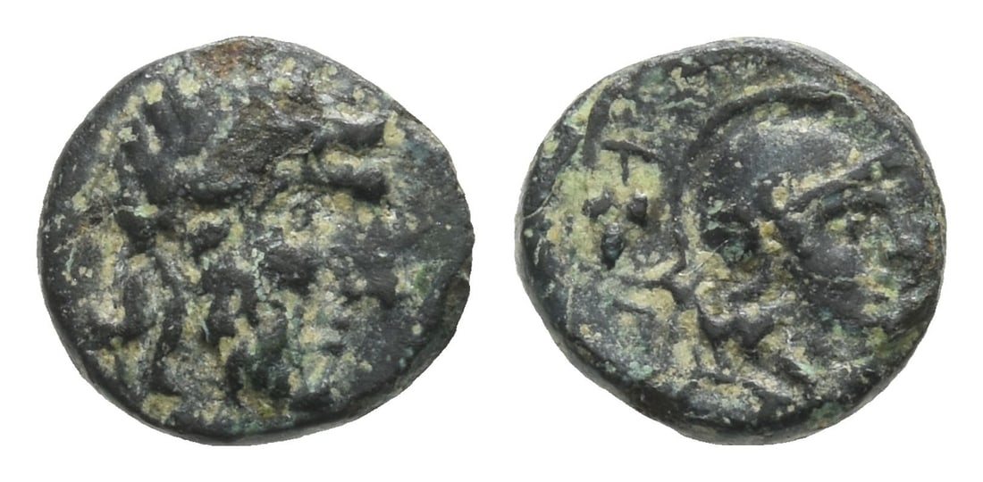 Aeolis, Autokane AE 9mm.: 4th century BC. Laureate head of Zeus to right / AYT[..], helmeted head of Athena to right; bunch of grapes behind. 0.66gr, 9mm, 12h. Very Fine. Acquired on the European coin market. Property of a Ken