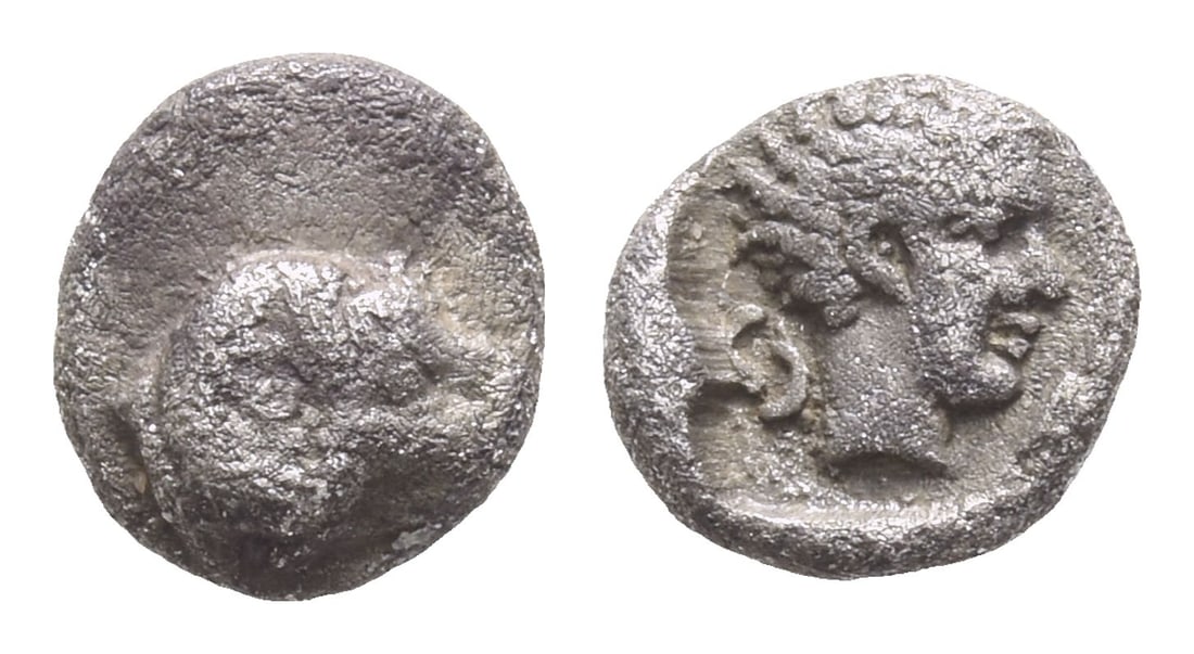 Caria, Kasolaba AR Hemiobol.: Circa 450-400 BC. Head of ram to right / Youthful male head to right; Carian letter to left; [to right, A?]; all within square incuse. Cf. HN Online 943; cf. Konuk, Kasolaba 7; cf. SNG Kayhan II, 1637
