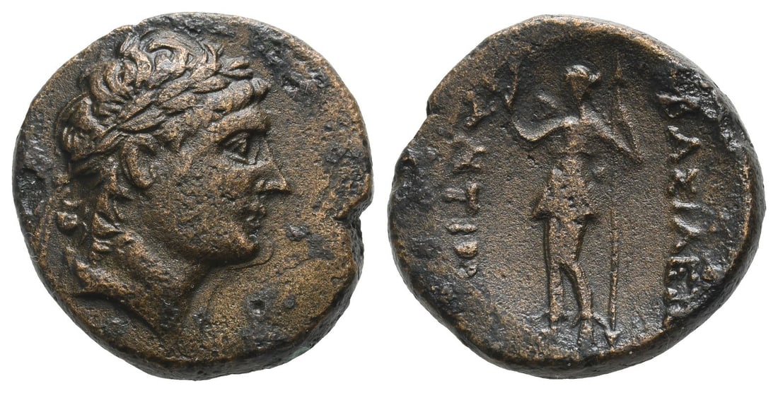Seleukid Empire, Antiochos I Soter AE 22mm.: 281-261 BC. Uncertain mint. Laureate head to right / B??????[?] ??????[??], Artemis standing to left, wearing short chiton, endromides, and quiver over shoulder, crowning the king's name with wreath i