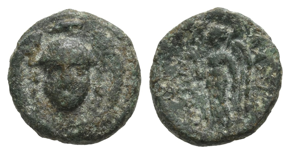 Seleukid Empire, Antiochos I Soter AE 13mm.: 281-261 BC. Smyrna, Sardes, or Magnesia on Mt. Sipylus mint.. Helmeted head of Athena facing / ???????? ????????, Nike standing to left, holding wreath and palm frond; [monogram to outer left?]. Cf. S