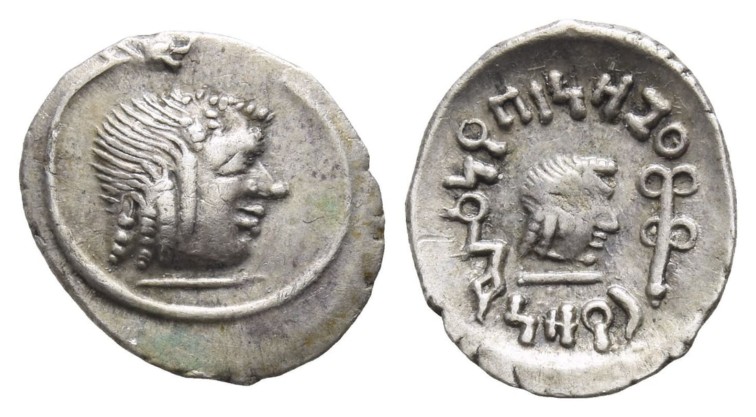 South Arabia. Himyar, 'Amdan Bayan Yahaqbid AR Unit.: Circa AD 100-120. Raydan mint. Head to right within circular torque / Small head to right; yanaf-monogram to left, 'sceptre' to right. CAF 3.2ai; Huth 430-1. 1.05gr, 15mm, 2h. Good Very Fine. Ex Class