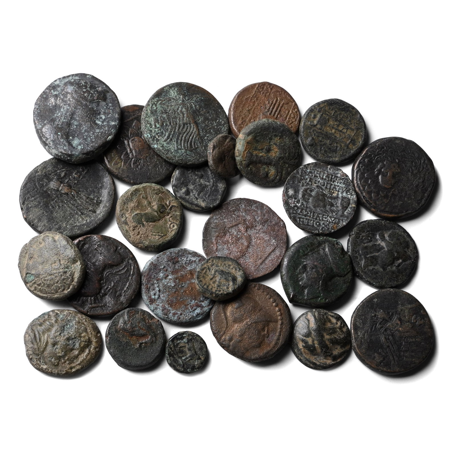 Group of Twenty Five (25) Greek AE Coins.: Circa 3rd-1st century BC. Comprising: mixed rulers, issues, denominations and reverse types. 137gr total. As shown. Property of a Cambridgeshire, UK, gentleman. TimeLine Auctions follows a rigorous ve