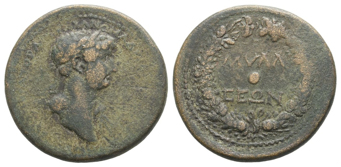 Hadrian AE 28mm of Mylasa, Caria.: AD 117-138. [????????]??? [???]????? ??[?????? ????????], laureate head to right, with drapery on left shoulder / ????-???? and central pellet within wreath of ears of corn and poppyheads; on the top,
