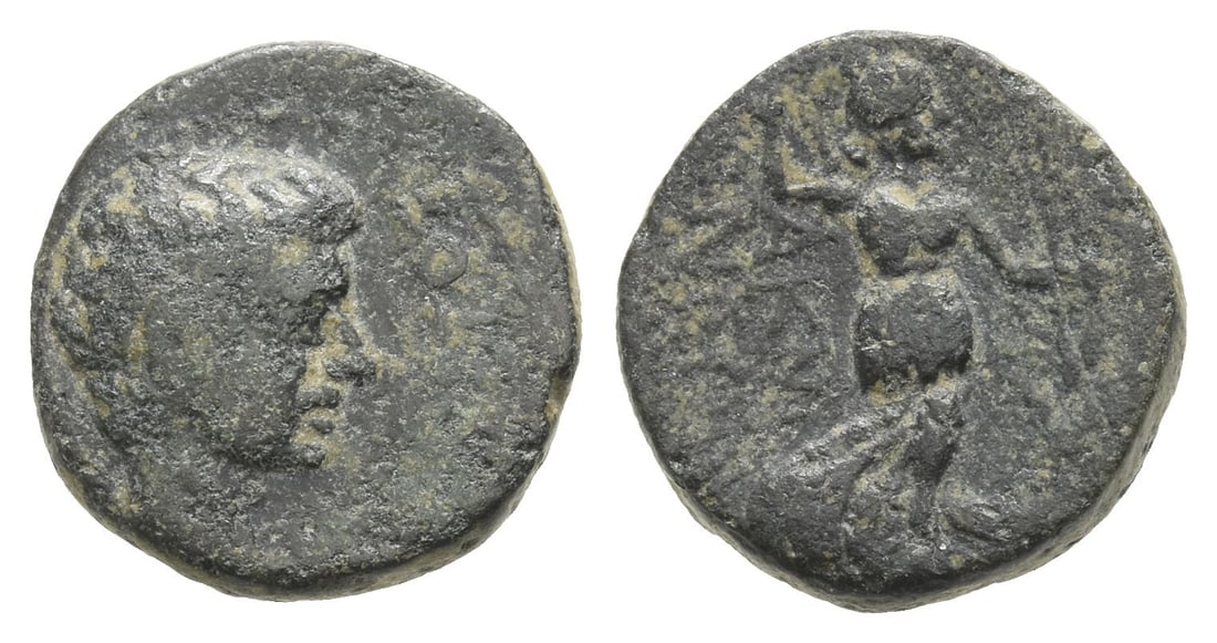 Tiberius AE 14mm of Acmoneia, Phrygia.: AD 14-37. [??????]??, bare head to right / Artemis advancing to right, drawing arrow from quiver and holding bow; stag to right, AKM-ONE?[N] in two lines to left. RPC I, 3169?. 3.08gr, 14mm, 2h. Near 