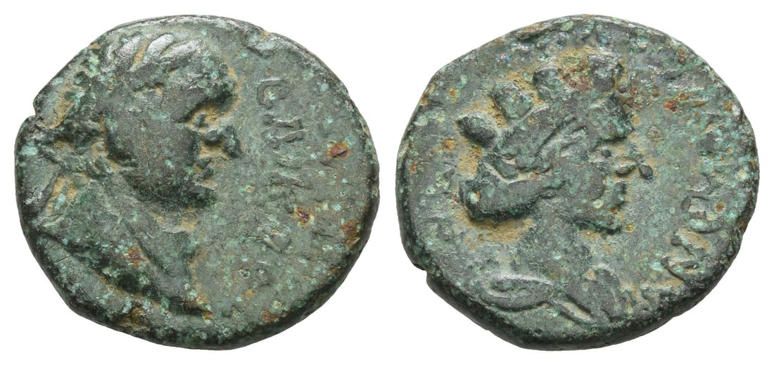 Titus AE 19mm of Anemurium, Cilicia.: AD 79-81. ????? ?????? (retrograde), laureate head to right / ??????????, turreted bust of Tyche to right. RPC II, 1702; Levante Supp. 105 corr. 5.02gr, 19mm, 7h. Near Very Fine. Rare. Acquired on the
