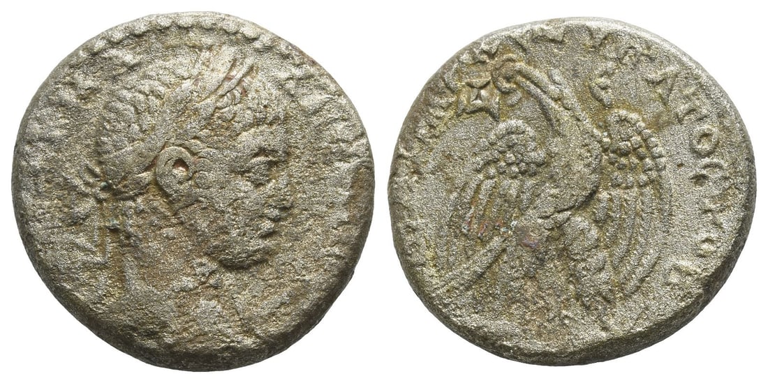 Elagabalus AR Tetradrachm of Antioch, Seleucis and Pieria.: AD 219. , laureate head to right, with slight drapery / , eagle standing facing with spread wings, head to left, holding wreath in beak; ? ? across upper fields, star between legs. RPC VI Online 7959 
