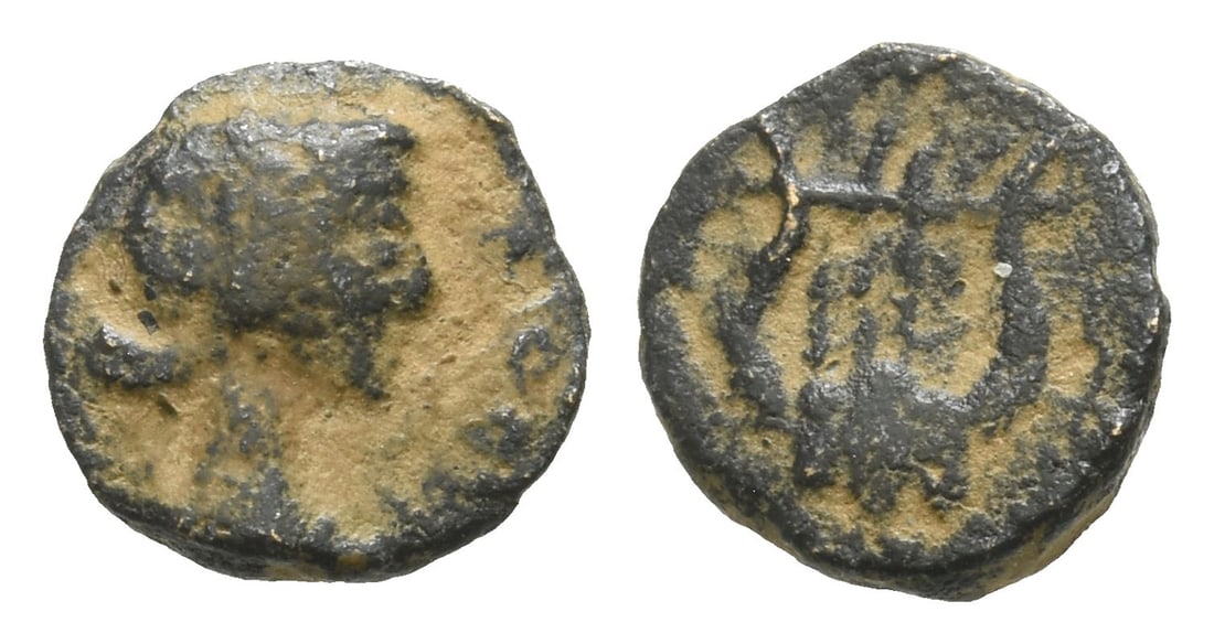Seleucis and Pieria, Antioch AE Chalkous.: Circa late 2nd-early 3rd century AD. Pseudo-autonomous issue. Laureate and draped bust of Apollo to right / Lyre. Cf. Butcher p. 404 and pl. 19, 2; cf. McAlee 168. 0.75gr, 9mm, 11h. Near Very Fine. Ac