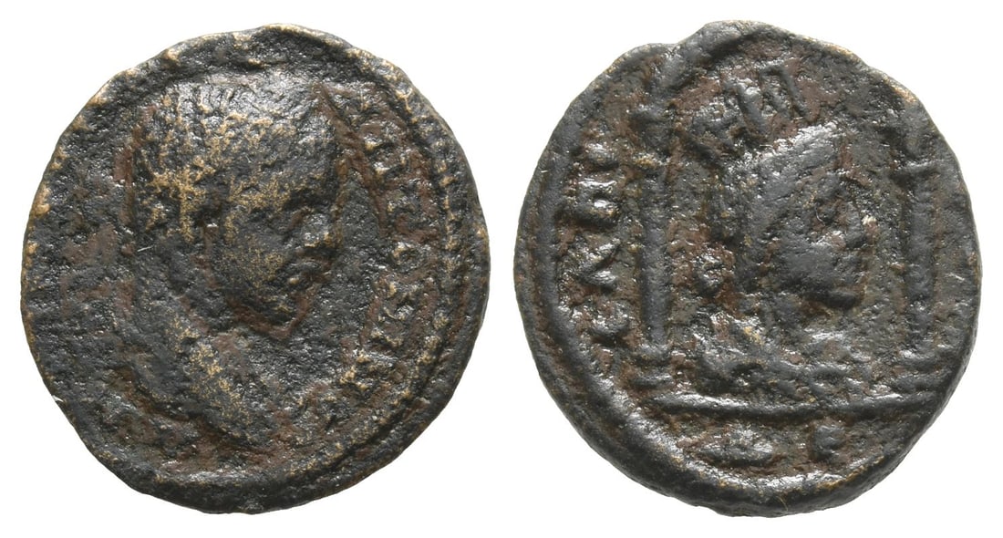 Elagabalus AE 18mm of Laodicea ad Mare, Seleucis and Pieria.: AD 218-222. [IMP C M AVR] ANTONINVS, laureate head to right / LADI[CEON], draped bust of Tyche to right within distyle arched shrine; ? E below. RPC VI Online 8152 (temporary); BMC 99 & 103; Lindgren 