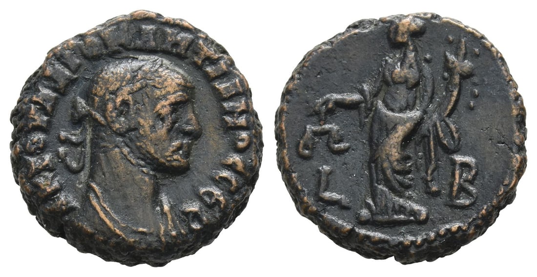 Diocletian BI Tetradrachm of Alexandria, Egypt.: Dated RY 2 (AD 285/6). ? ? ? ??? ???????????? ??? (sic), laureate and cuirassed bust to right / Dikaiosyne standing facing, head to left, holding scales and cornucopia; L B (date) across fields. RPC X