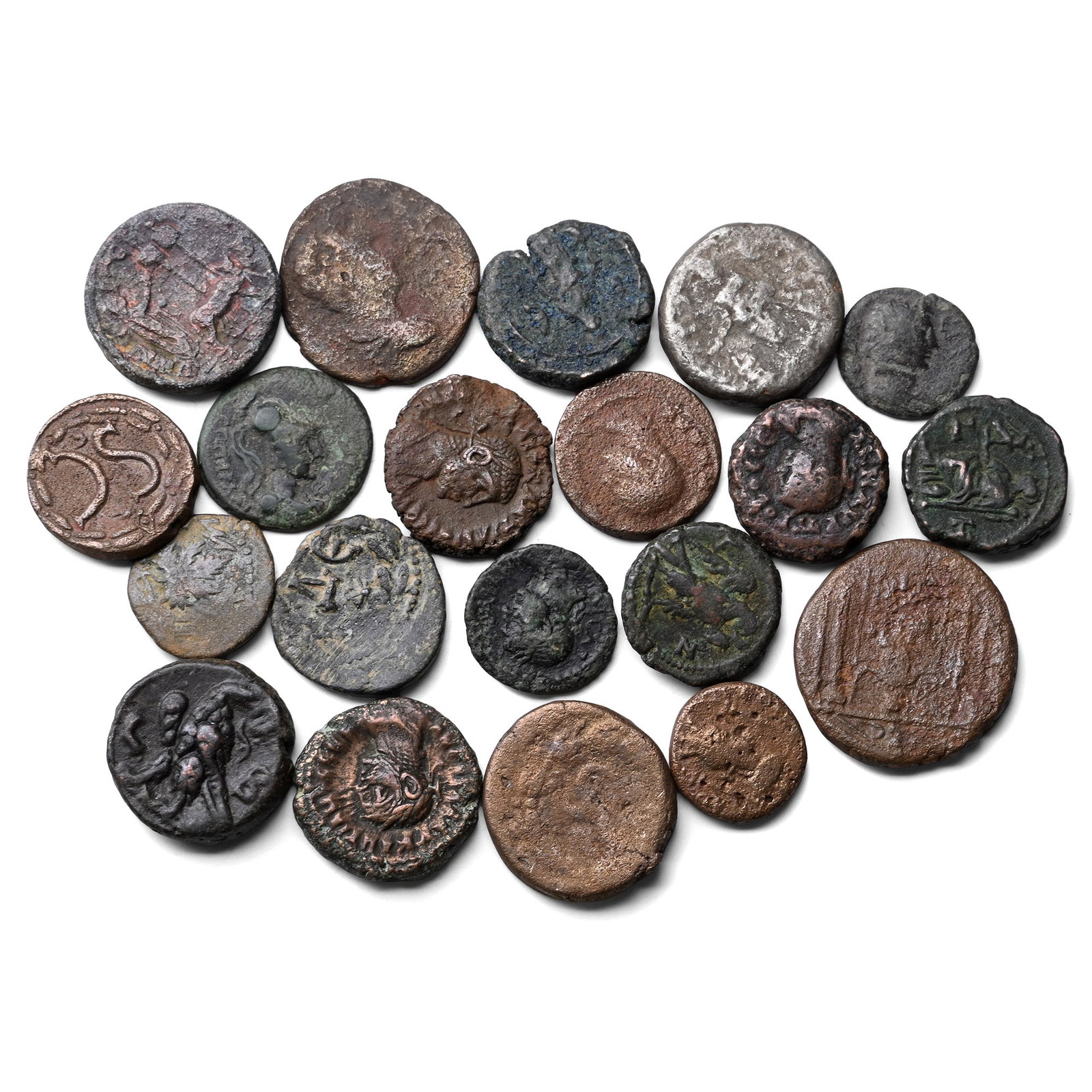 Group of Twenty (20) AE Roman Provincial Coins.: Circa 2nd-4th century AD. Comprising: mixed emperors, issues, denominations and reverse types. 132gr total. As shown. Property of a Cambridgeshire, UK, gentleman. TimeLine Auctions follows a rigorous 