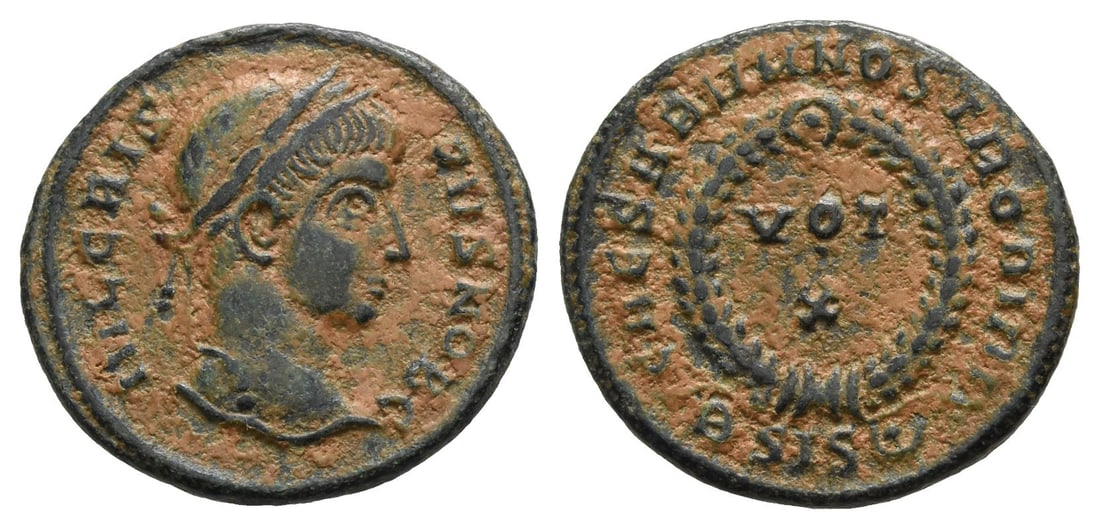 Crispus, as Caesar, BI Nummus.: AD 321-324. Siscia mint. 9th officina. IVL CRISPVS NOB C, laureate head to right / CAESARVM NOSTRORVM around wreath with jewel at apex containing VOT X in two lines; ?SIS(pellet in crescent) in exergu