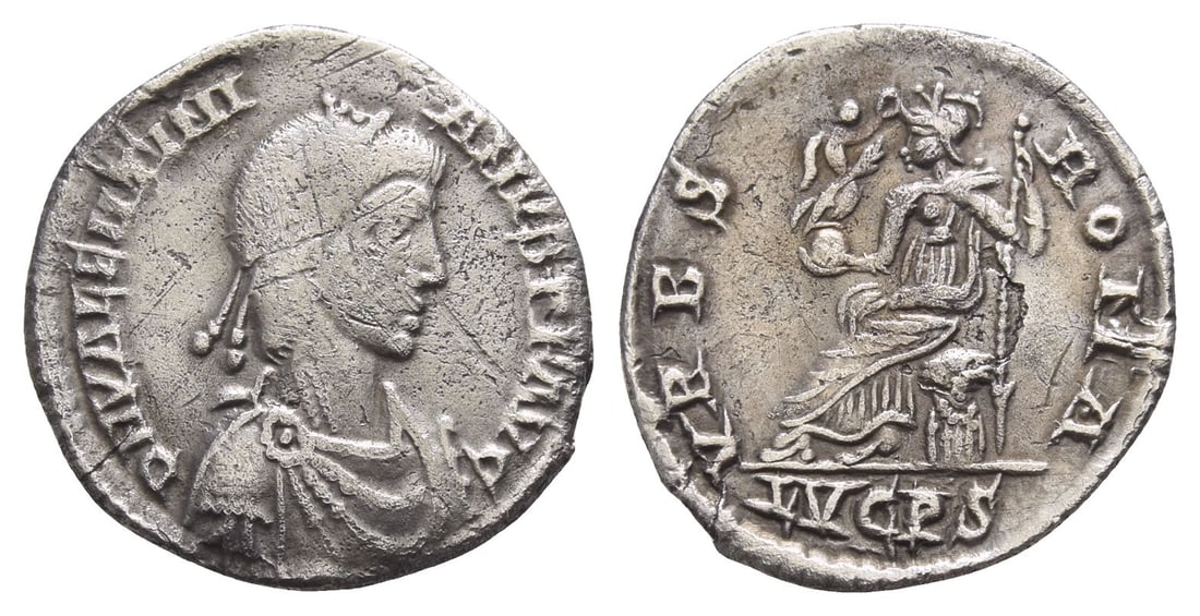 Valentinian II AR Siliqua.: AD 388-392. Lugdunum mint. D N VALENTINIANVS P F AVG, pearl-diademed, draped and cuirassed bust to right / VRBS ROMA, Roma seated to left on cuirass, holding Victory on globe and inverted spear; LVGPS
