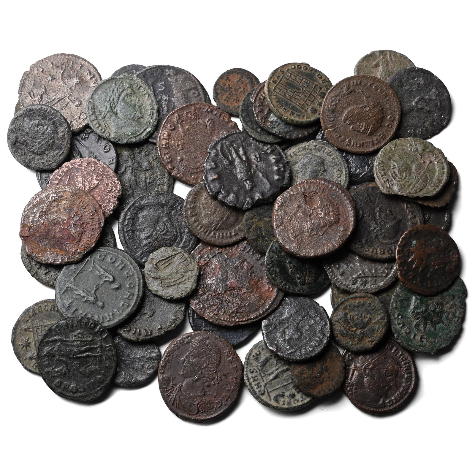 Group of Fifty (50) AE and AR Roman Coins.: Circa 3rd-4th century AD. Comprising: mixed emperors, issues, denominations and reverse types. 134gr total. As shown. Property of a Cambridgeshire, UK, gentleman. TimeLine Auctions follows a rigorous 