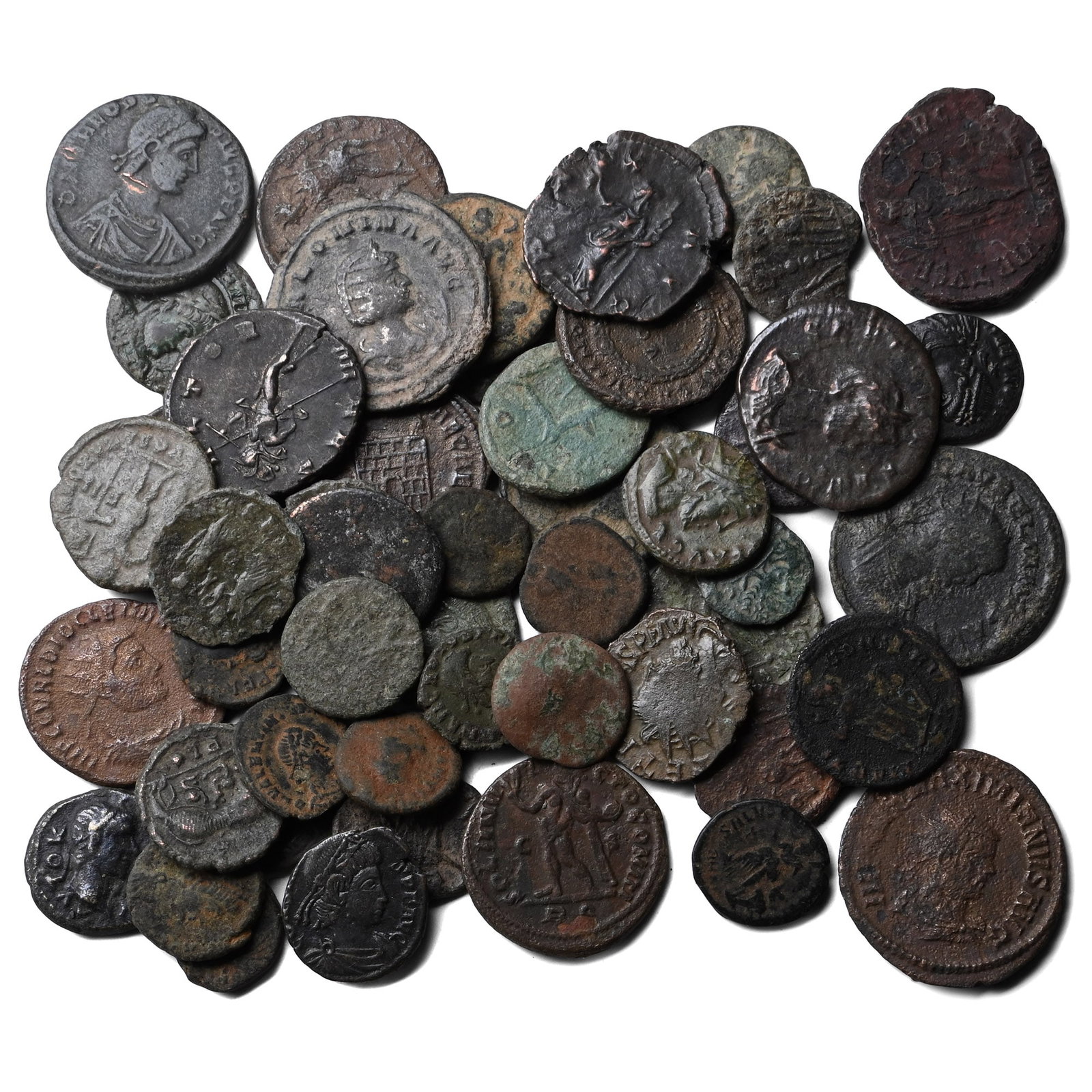 Group of Fifty (50) AE Roman Coins.: Circa 2nd-4th century AD. Comprising: mixed emperors, issues, denominations and reverse types. 103gr total. As shown. Property of a Cambridgeshire, UK, gentleman. TimeLine Auctions follows a rigorous 