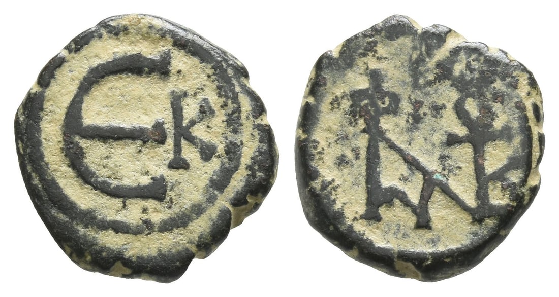 Justin II, with Sophia AE Pentanummium or 5 Nummi.: AD 565-578. Cyzicus mint. Large Justin and Sophia monogram / Large ?; K to right. DOC 137; MIB 53; SB 375. 2.02gr, 14mm, 6h. Very Fine. Acquired on the European coin market. Property of a Kent, UK, ge
