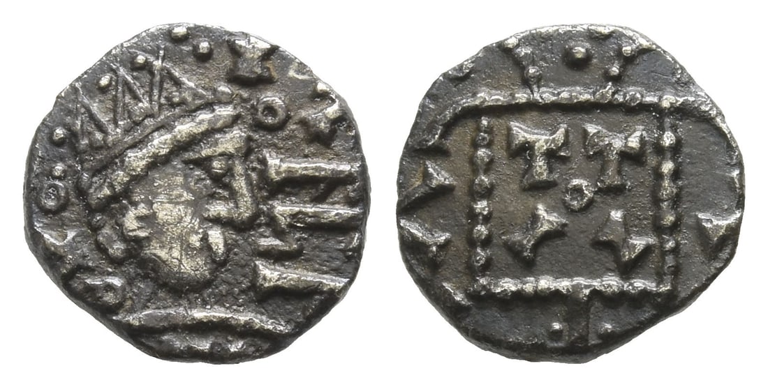 Anglo-Saxon. Primary Sceattas AR Sceat.: Circa 690-710/5. Mint in Kent or East Anglia. Series C2, type 2b.. Radiate bust to right on pyramidal neck; ? flanked by two annulets to left, annulet between Ts and runic apa to right / 'Standard' wi