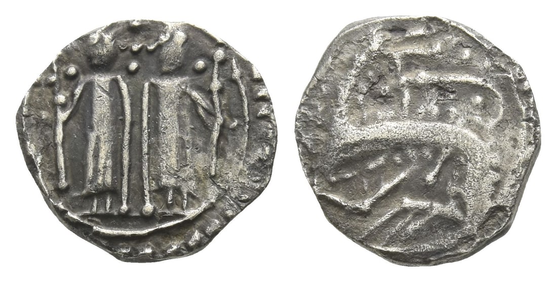 Anglo-Saxon. Secondary Sceattas AR Sceat.: Circa 710/5-720/5. Mint in east Kent or the lower Thames region. Series N, type 41b.. Two standing figures with elongated limbs, pellet cross between their faces, each holding long cross / Monster to 