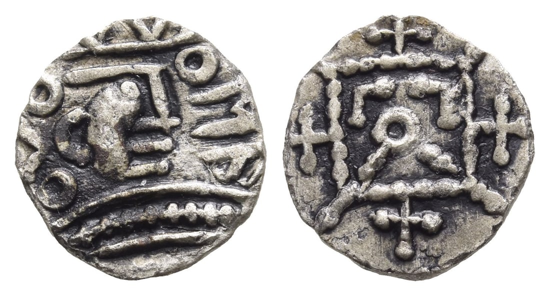 Anglo-Saxon. Secondary Sceattas AR Sceat.: Circa 710-730. Mint in East Anglia (Central Norfolk). Series R3. Radiate bust to right, ? and annulets to left; runic gepa to right / 'Standard' with central annulet, chevrons in upper corners, diagon