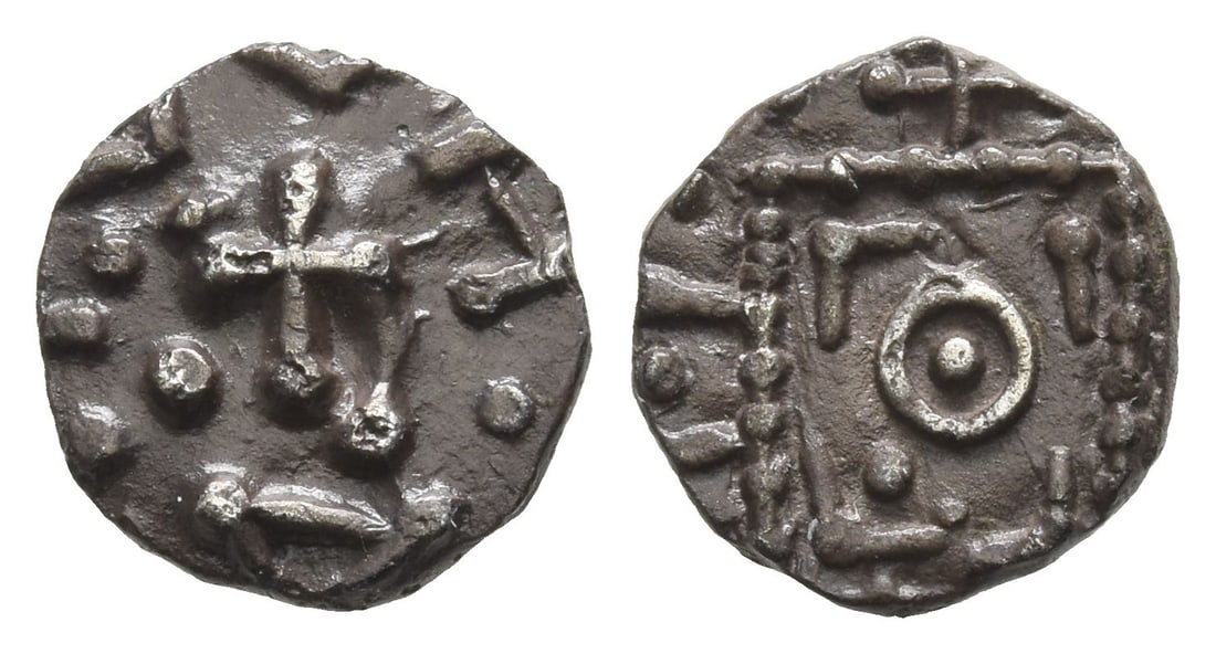 Anglo-Saxon. Continental Sceattas AR Sceat.: Circa 690-710/5. Mint in northern Frisia (prob. Wijnaldum). Struck under Radbod, King of Frisia. Series D, type 8.. Cross pomm?e, pellets in two angles; blundered legend around / 'Standard' with degen