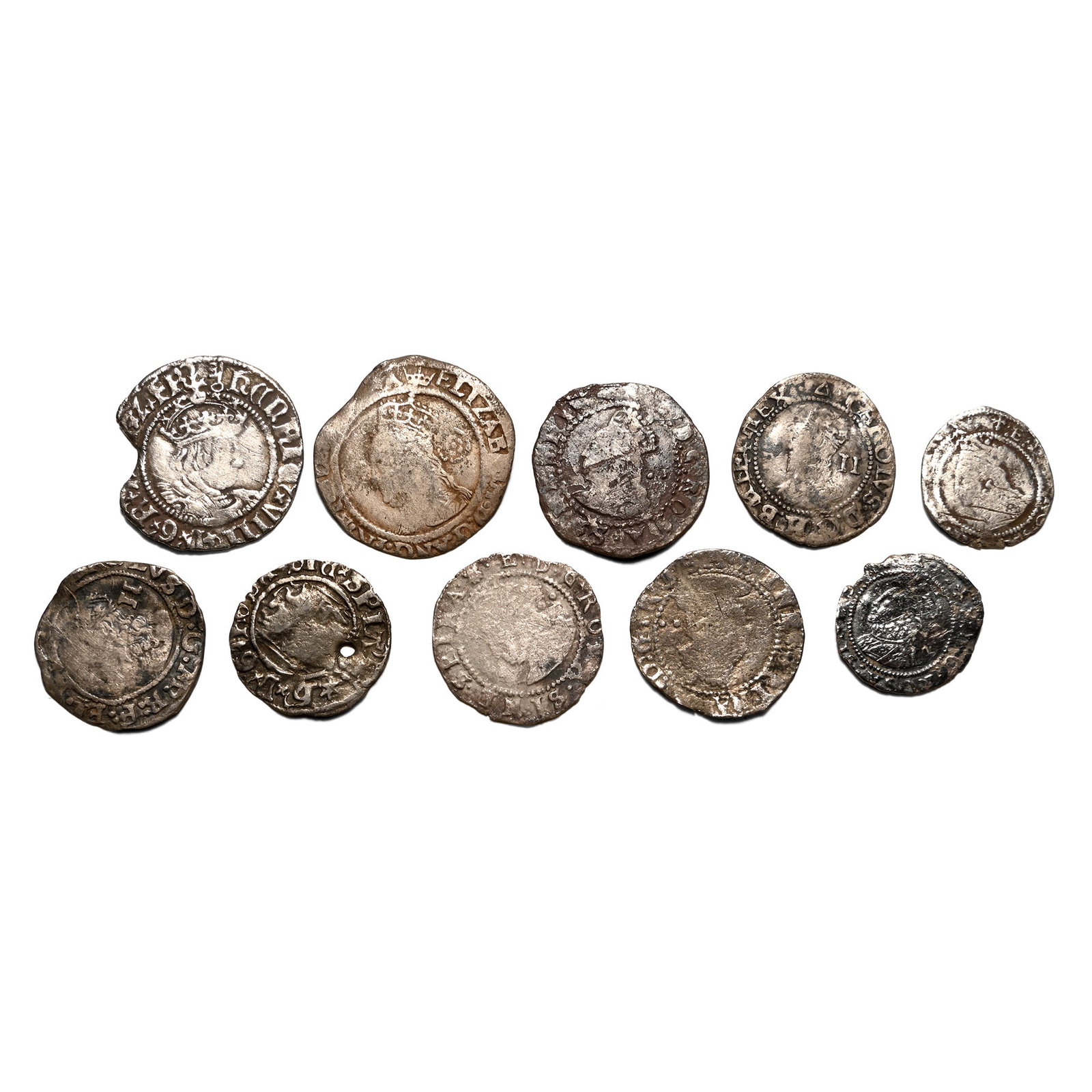 Group of Ten [10] Tudor and Stuart English AR Hammered Coins.: 16th-17th century AD. Comprising: mixed monarchs, mints and issues including Henry VIII, Elizabeth I and Charles I. 8.02gr total, 14-19mm. As shown. Acquired on the UK art market. From the collection 