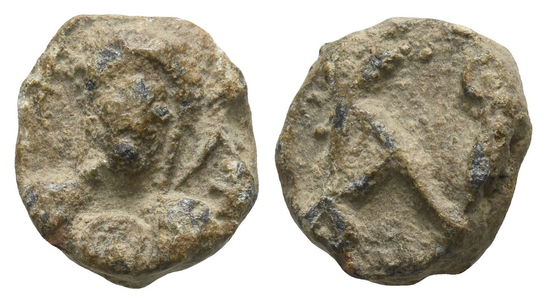 Byzantine Iconographic PB Seal.: Circa 11th century AD. Half-length facing bust of the Theotokos, holding Holy Infant medallion on breast / Block(?) monogram. 3.60gr, 14mm, 6h. Condition as seen. Acquired on the European coin market.