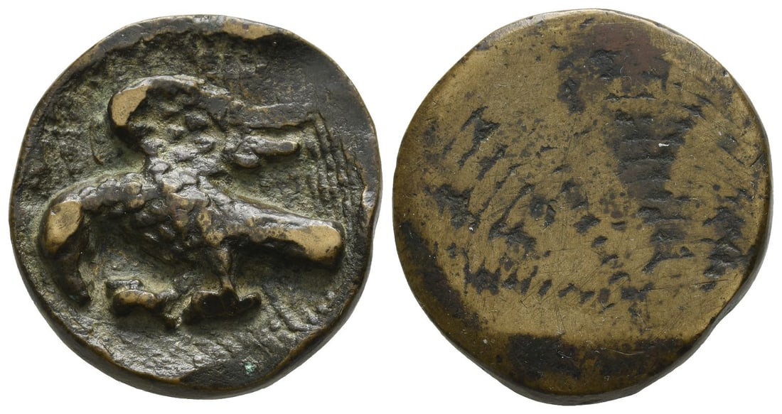 French AE Civic Weight.: 12th-13th century AD. or later. Round cast bronze trade weight with perched eagle facing left with wings raised / Blank. 37.21gr, 34mm. Good Fine. From a UK collection. Property of a London, UK, antiq