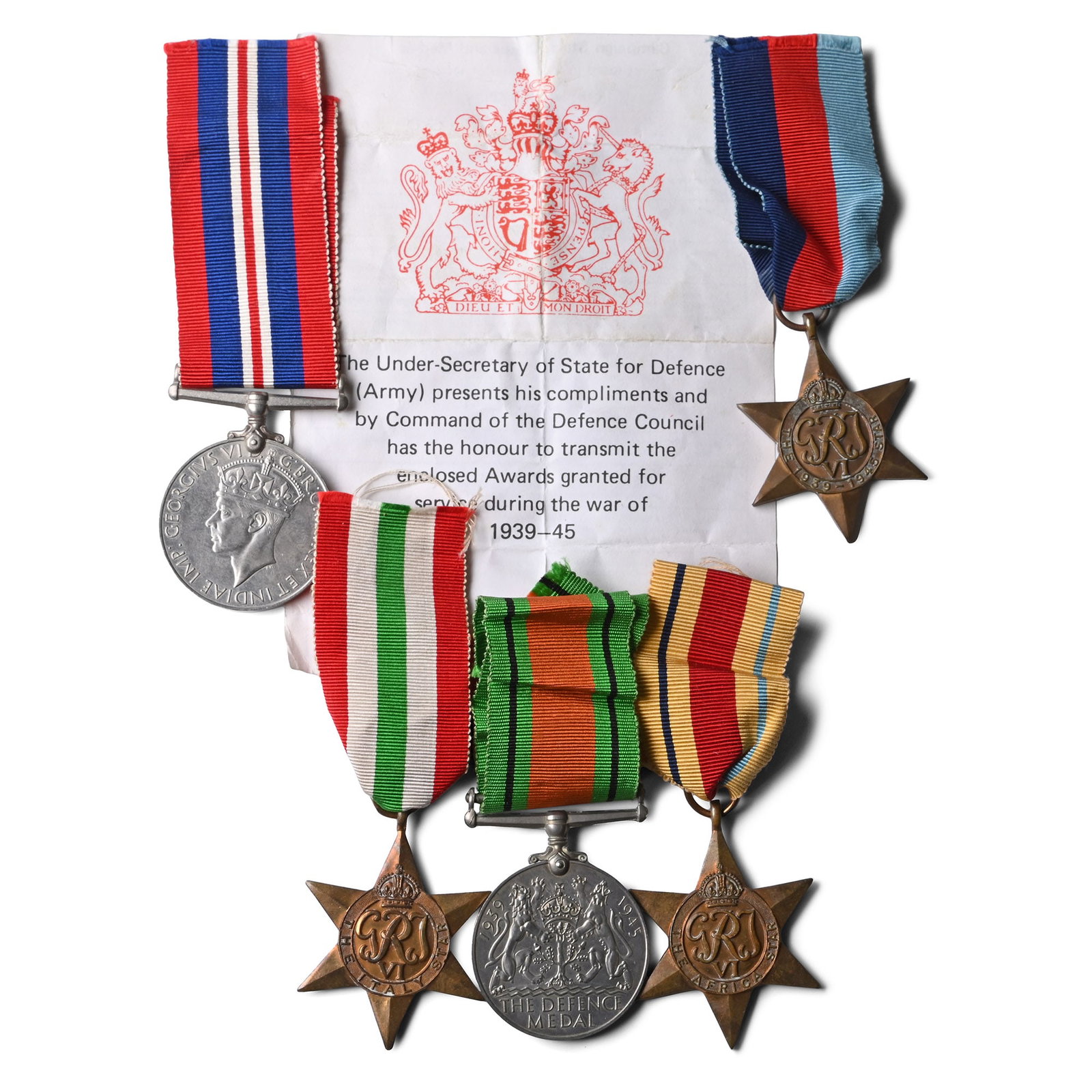 WWII Campaign Star and Medal Group for H.R. Harlott.: 1939-1945. A box stamped 'Army Medal Office' addressed to H.R. Hylott of Frinton-on-Sea in Essex, with contents sheet and five medals comprising: 1939-45 Star, Africa Star, Italy Star, Defence medal, 