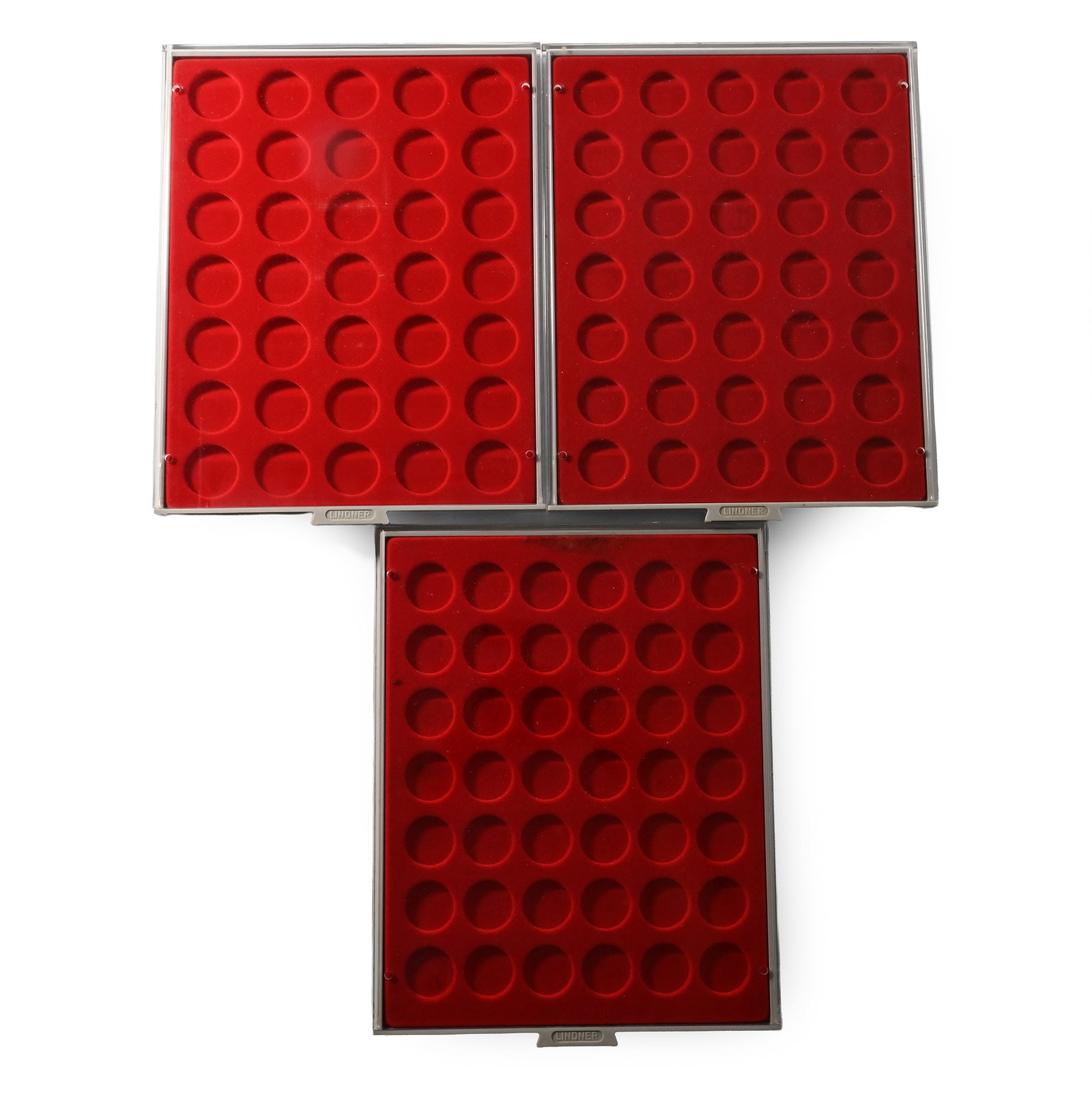 Group of Three [3] Lindner Lined Coin Trays: 21st century AD. Comprising three coin trays with circular inserts for 42 coins. 1.62 kg total, 30.5 x 24 cm each (12 x 9 1/2 in.). [3, No Reserve] From the private collection of a Sussex, UK, gentlem