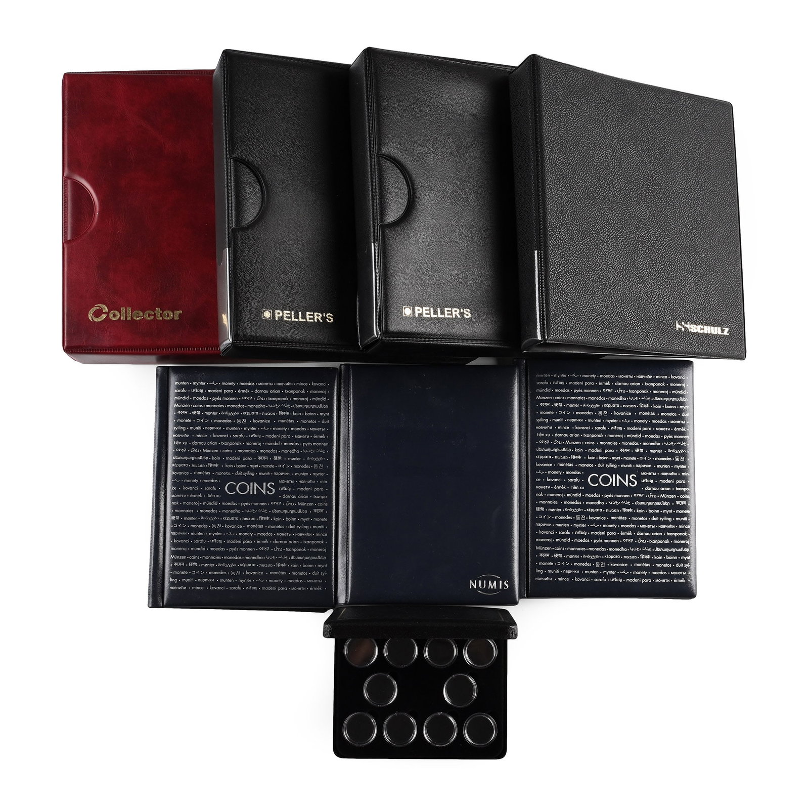 Group of Eight [8] Coin Albums and Coin Case.: 21st century AD. Comprising four albums with pages, three cased albums and one small case for ten coins. 4.49 kg total,14.5-24 cm (5 3/4 - 9 1/2 in.). [8, No Reserve] From the private coin collection 