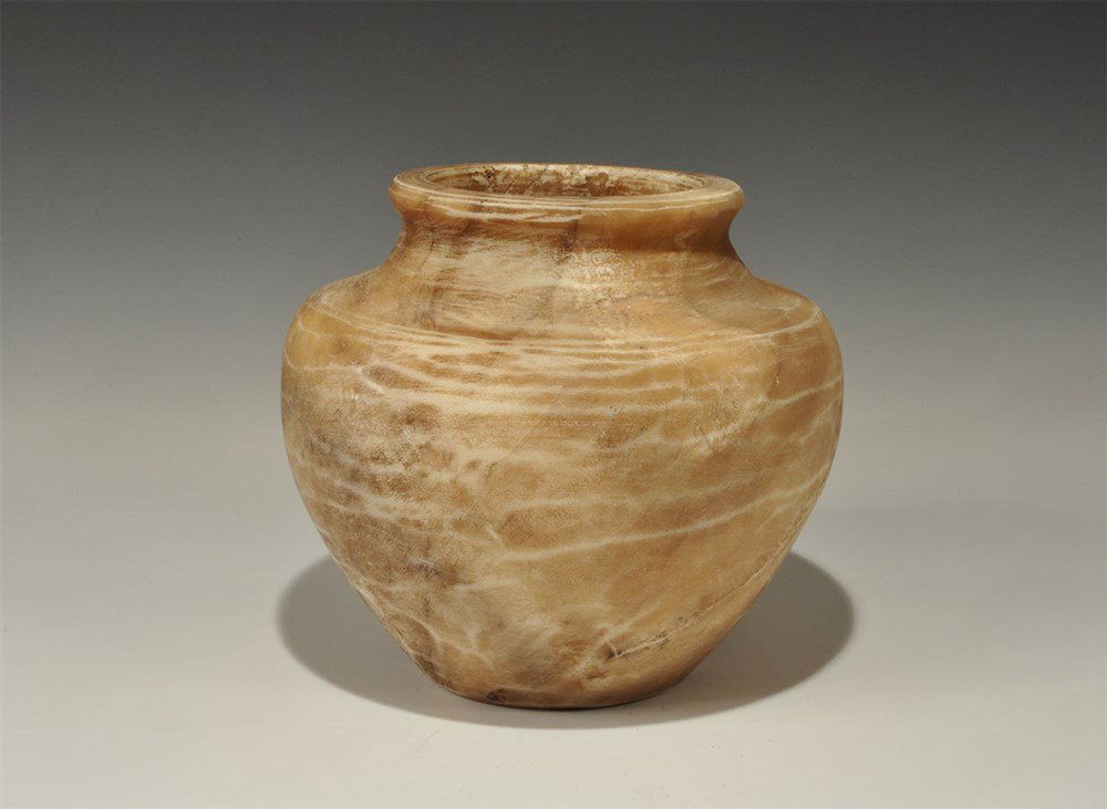 Greek Bactrian Style Alabaster Vessel: An undated archaistic carved stone vessel with mammiform body, broad shoulder and thickened rim. 7.2 kg, 20 cm (8"). Acquired on the London art market in the 1960s.