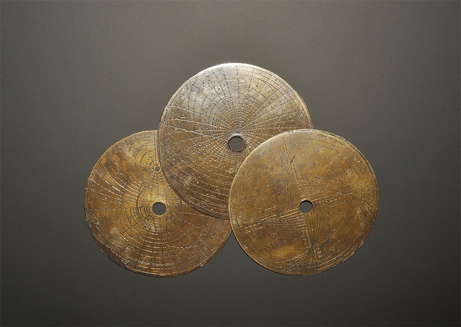 Islamic Style Brass Astrolabe Disc Group: A group of three undated archaistic brass astrolabe discs with incised quadrants and arcs, numeric notation. 78 grams total, 89 mm each (3 1/2"). From a Buckinghamshire collection, UK; acquired in the