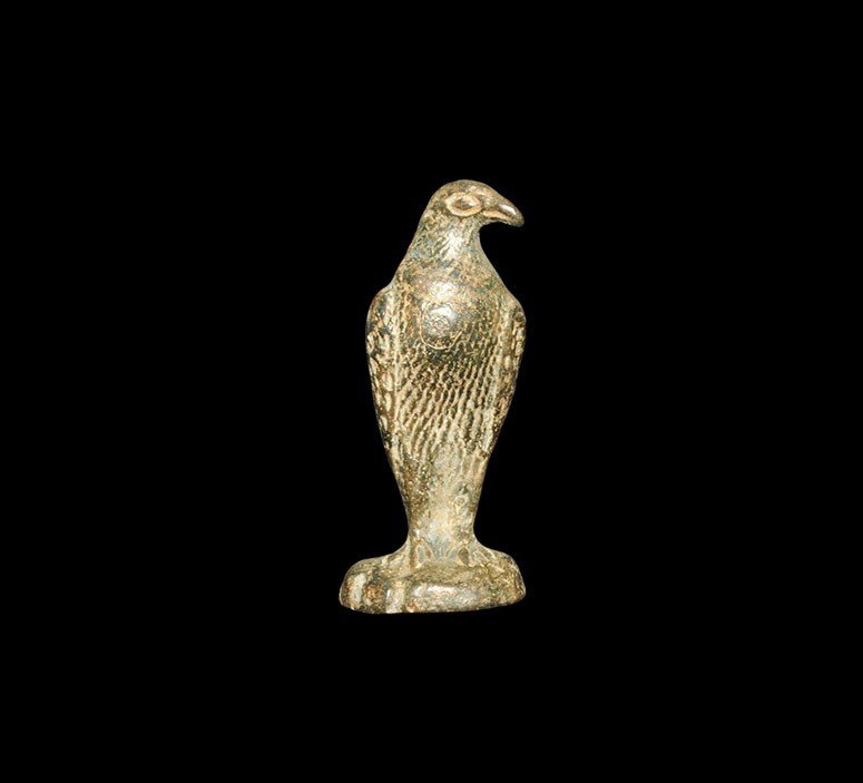 Islamic Style Bronze Falcon Figurine: An undated archaistic cast figurine of a falcon seated with head tilted to one side. 92 grams, 67 mm (2 3/4"). Acquired UK art market, in the 1980s. [No Reserve]