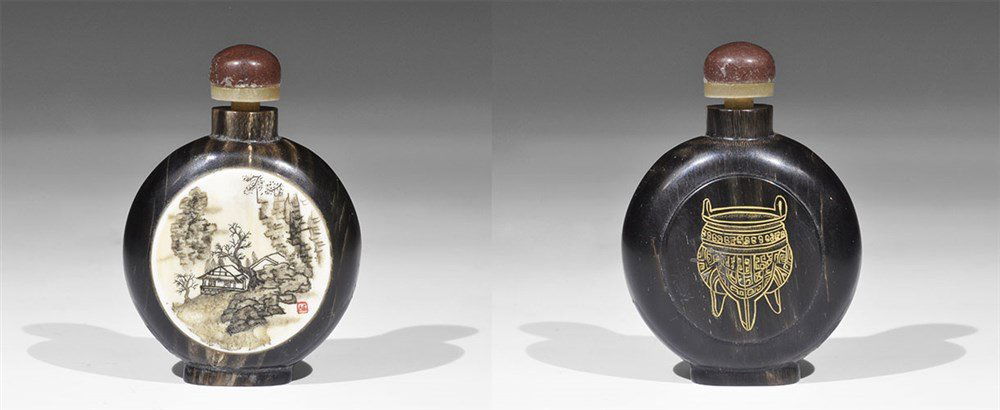 Japanese Antique Horn Snuff Bottle with Spoon Lid: 20th century AD or earlier. A carved snuff bottle with domed lid and bone spoon, bone plaque inserted to one face with engraved and painted scene and red signature block, incised tripod cauldron motif