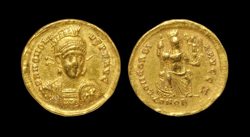 Roman Honorius - Constantinopolis Gold Solidus: 393-423 AD, Constantinople mint. Obv: D N HONORI-VS P F AVG legend with helmeted, diademed and cuirassed bust facing three-quarters right, holding spear over shoulder and shield decorated with horsema