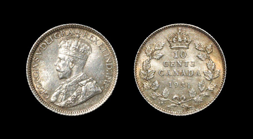 World Canada - George V - 1931 - 10 Cents: Dated 1931. Obv: profile bust with GEORGIVS V DEI GRA REX ET IND IMP legend. Rev: crown over 10 CENTS CANADA legend in three lines with date below and within wreath. KM# 23a. 2.32 grams. [No Reserve]