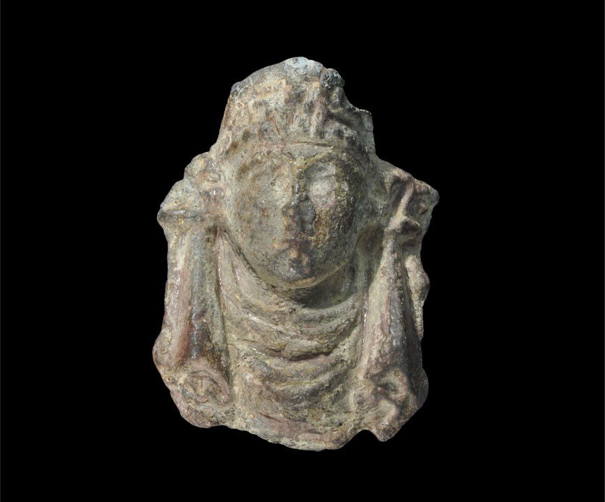 Roman Bronze Casket Mount: 1st-2nd century AD. A cast mount in the form of a female bust with draperies to the sides, tiara to the brow; hollow to the reverse. 52 grams, 52 mm (2"). Found Norton Disney, Lincolnshire, UK, in 197