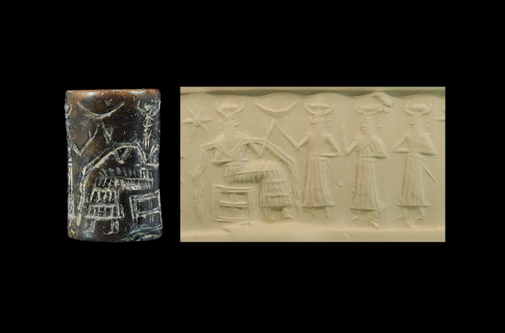 Near Eastern Akkadian Stone Cylinder Seal with: 2400-2200 BC. A large reddish brown to black limestone cylinder seal depicting a presentation scene: the god sitting on the left on an angular stool wearing a horned tiara and long flounced robe, rais